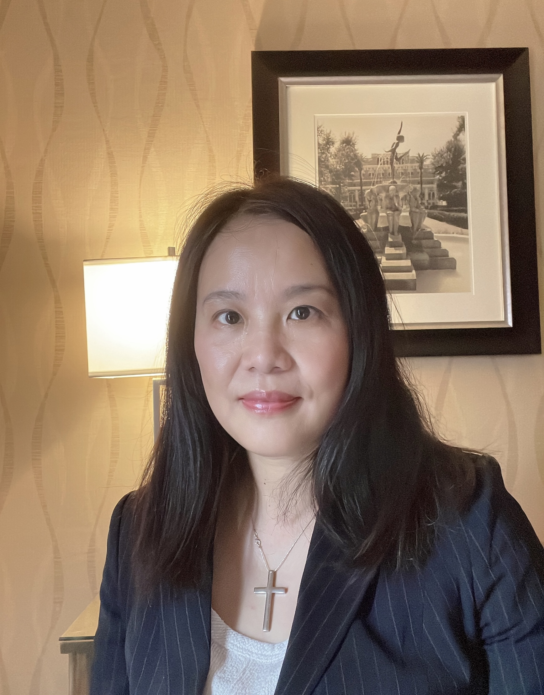 Julie Yuan - Qualified Managing Director (QMD)